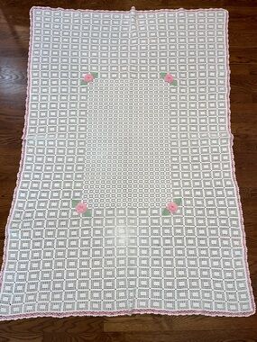 Handmade crocheted piece with roses